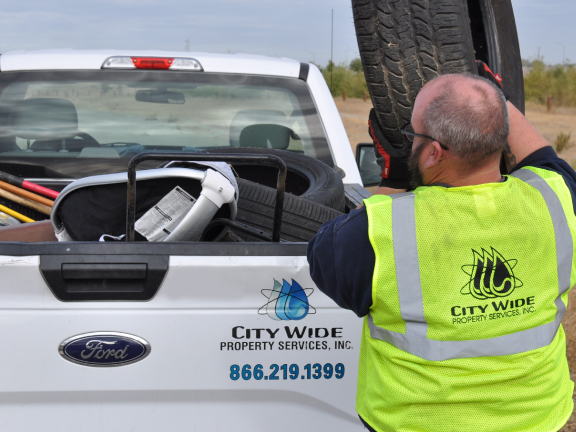 Close-up of technician working on parking lot 