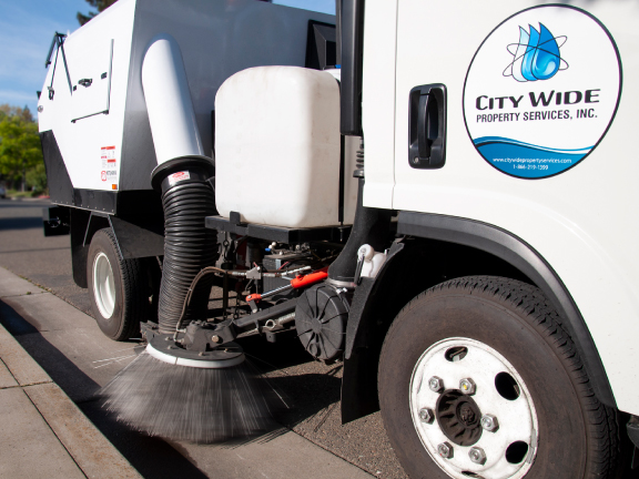 Close up of a sweeper truck